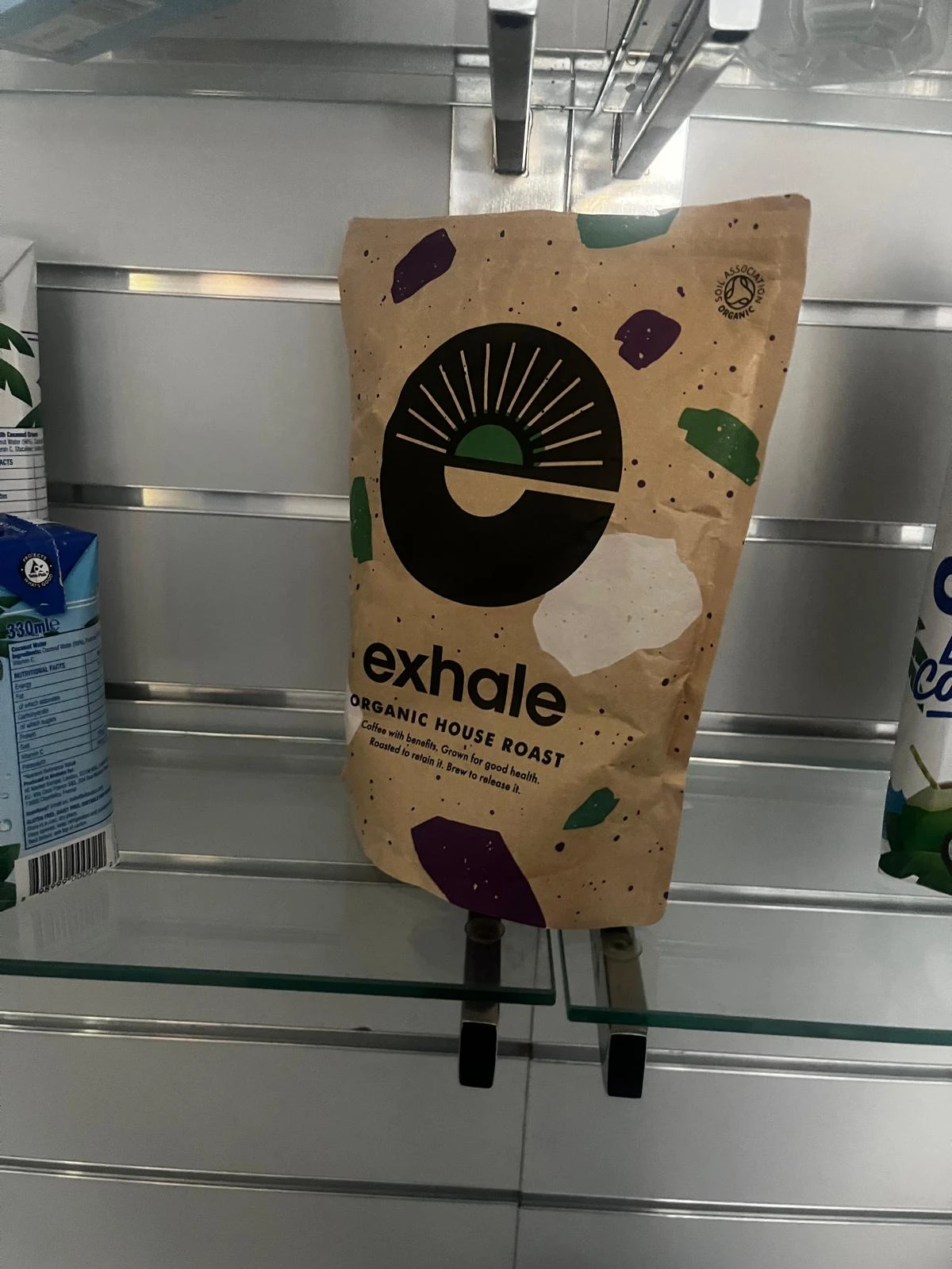 Exhale Organic House Roast coffee bag on the display shelf